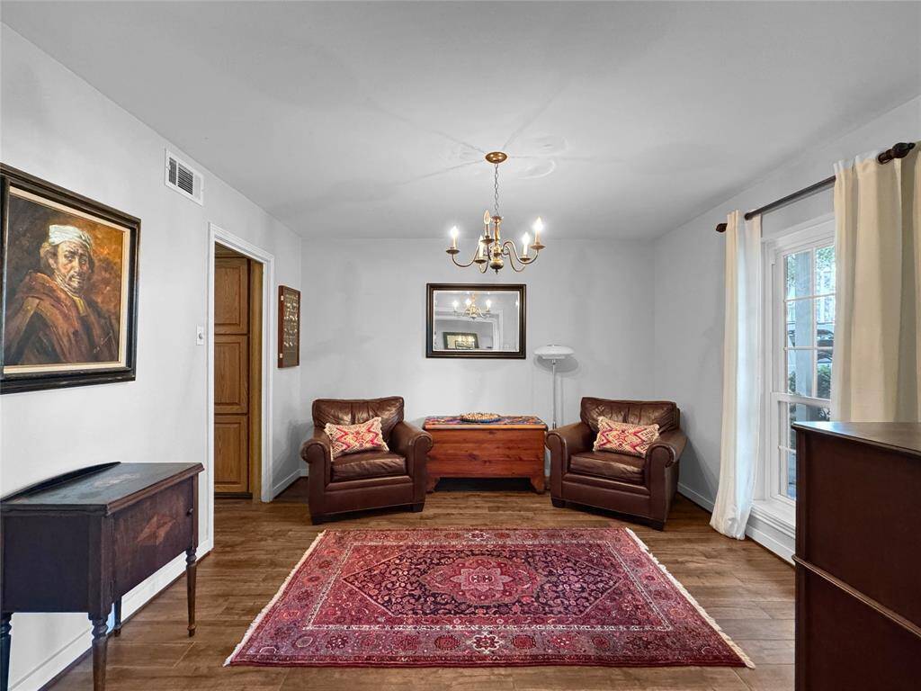 Study or home office overlooking front yard and connected to the kitchen.