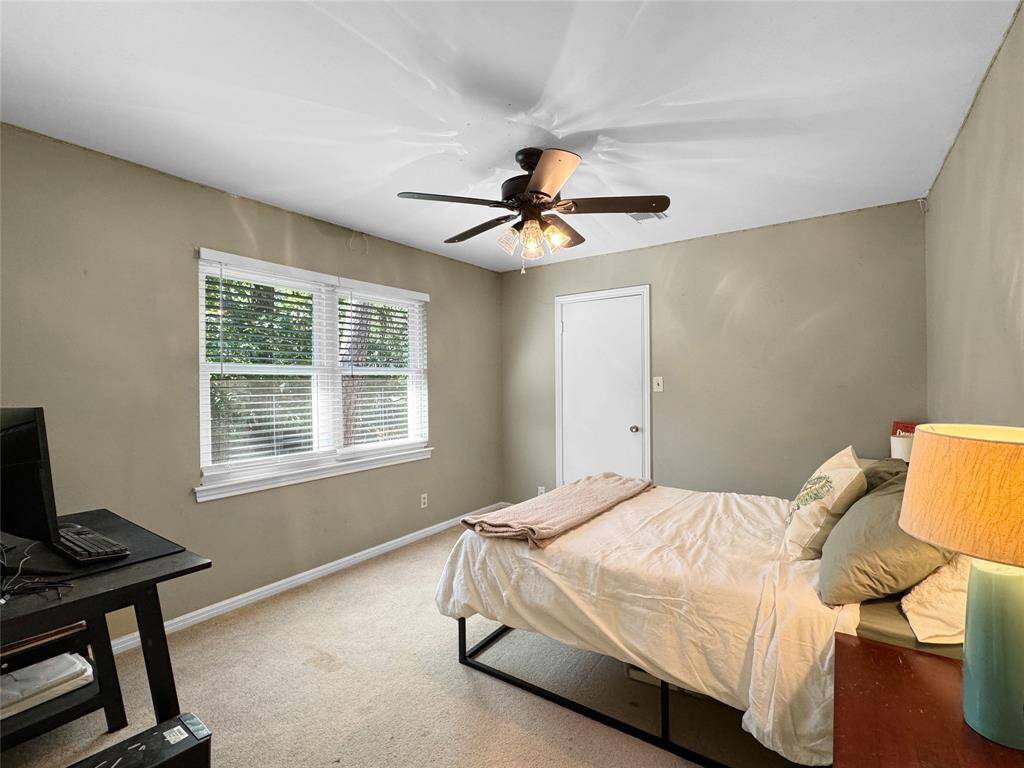 Second bedroom overlooking back yard.