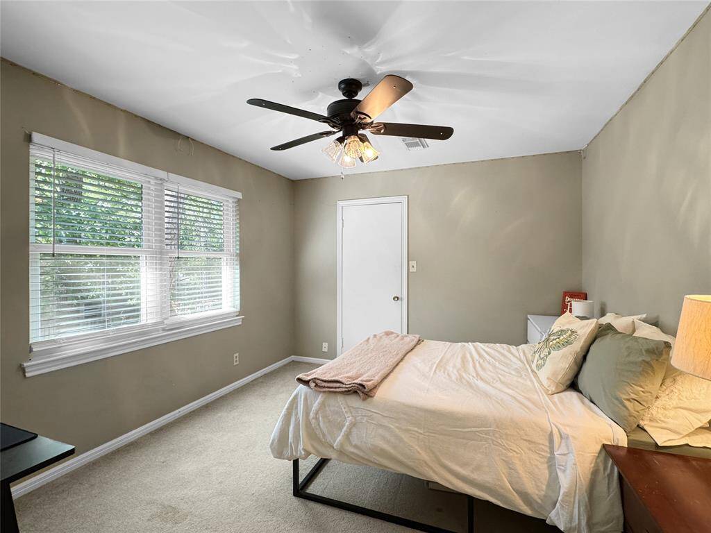 Second bedroom overlooking back yard.