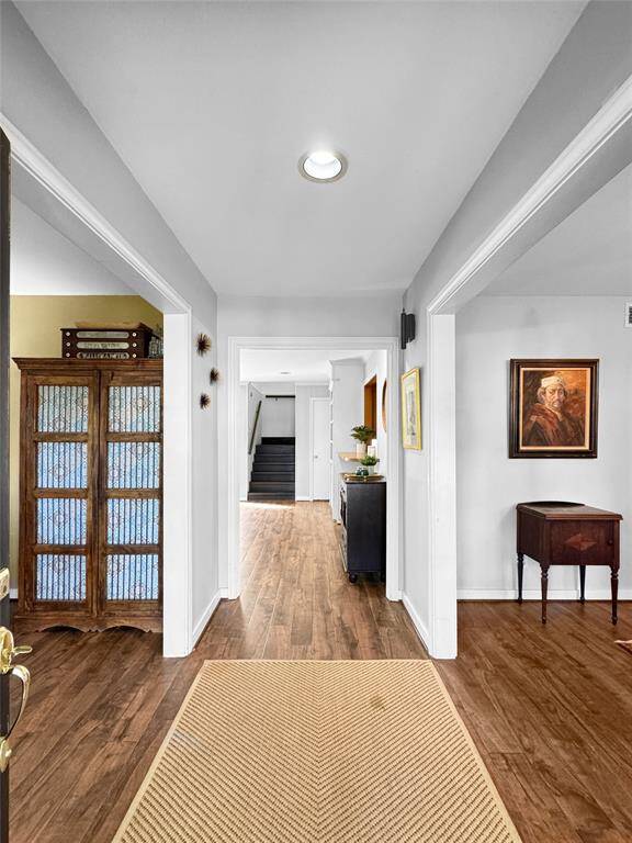 Welcome to 13138 BarryknollLn. Foyer enters to forml dining room on the left, sitting room or office on the right and primary living room in the end.
