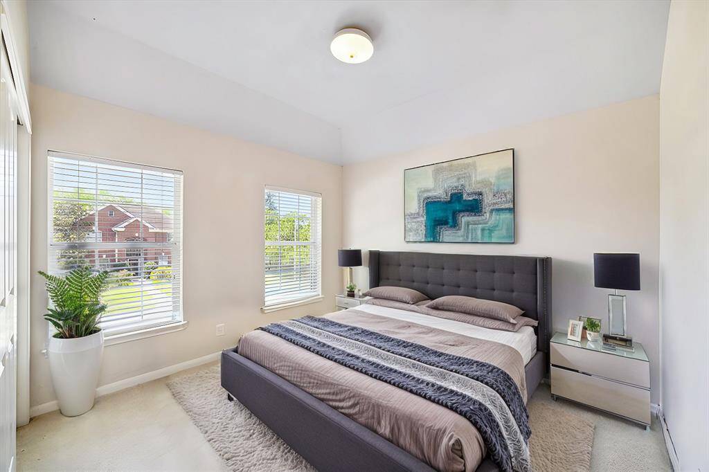 ONE OF THE SECONDARY BEDROOMS. *This photo has been virtually staged*