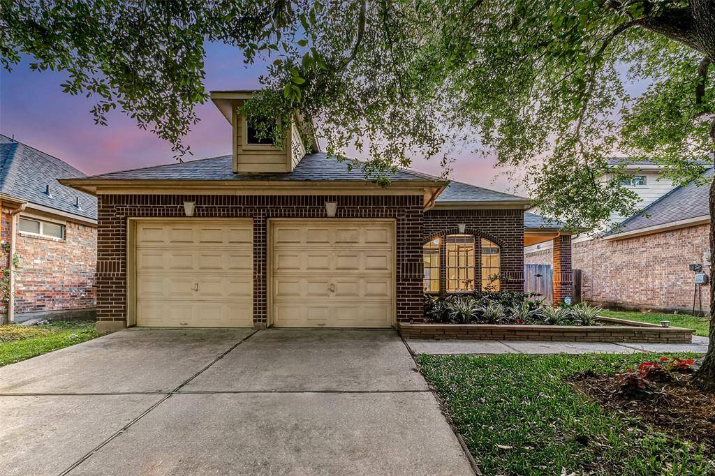 This charming home has exceptional curb appeal,featuring a meticulously crafted brick exterior beautifullyenhanced by customlandscaping, adding to its timeless elegance.