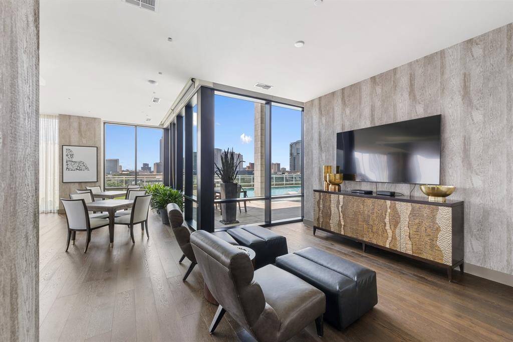 Enjoy beautiful views of the pool and city from the lounge.