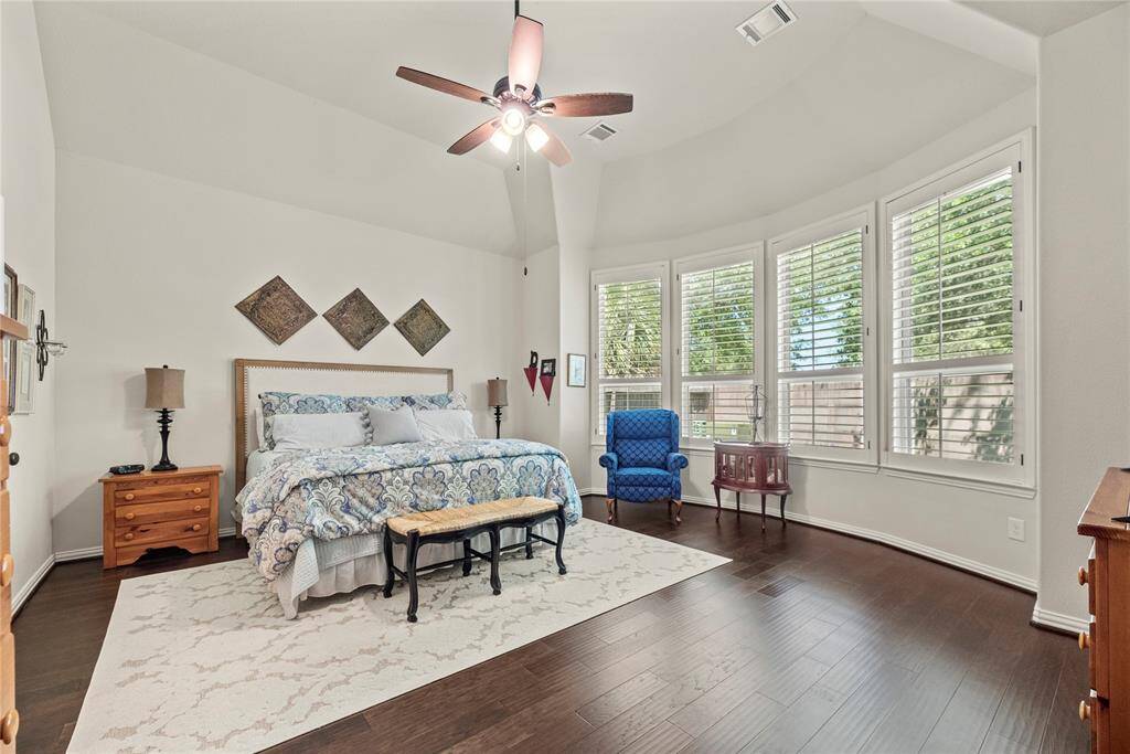 How perfect is this primary suite? Spacious and filled with natural light, this serene retreat offers the ultimate escape, promising comfort, tranquility, and pure relaxation.