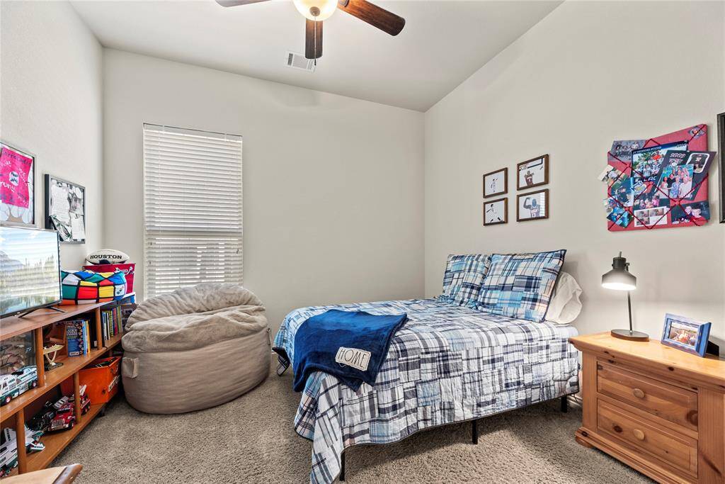 Your fourth bedroom offers a generous and inviting space that exudes comfort and versatility.