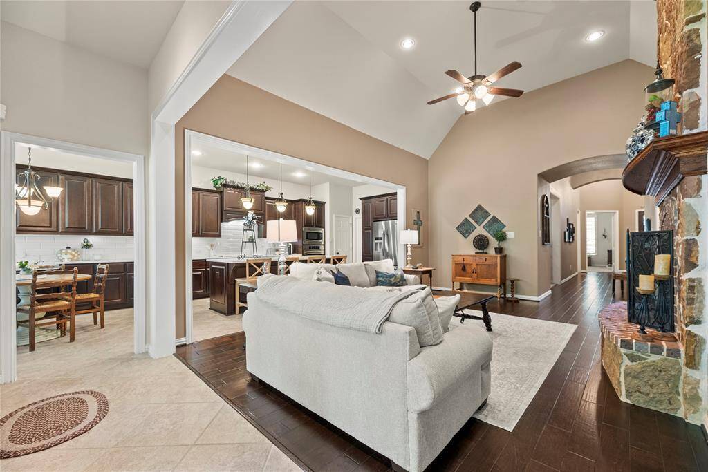 This home is just filled with so much beautiful natural light through the walls of windows. The beautiful high ceiling adds to the designer feel.