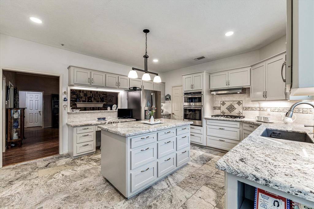 The kitchen is open to the living room.