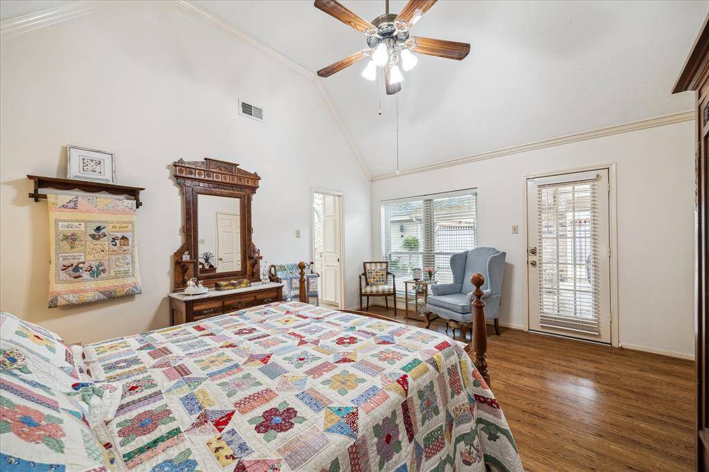 The primary bedroom has gorgeous views to the backyard.