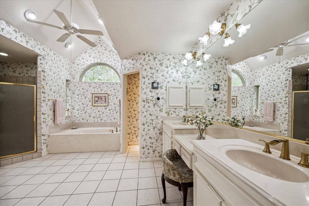 Double sinks, a soaking tub and a large walk in shower.