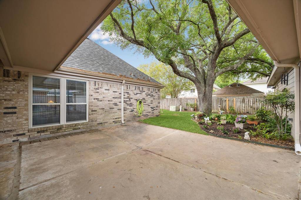 The back porch has room for entertaining!