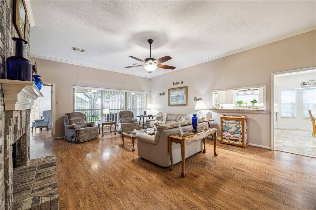 The living room has lovely views to the backyard.
