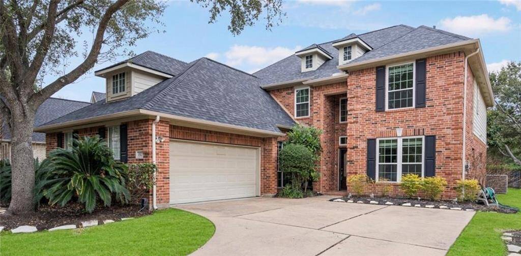 Welcome to 1523 Lakeside Enclave Drive - a meticulously maintained home, ready for move-in!