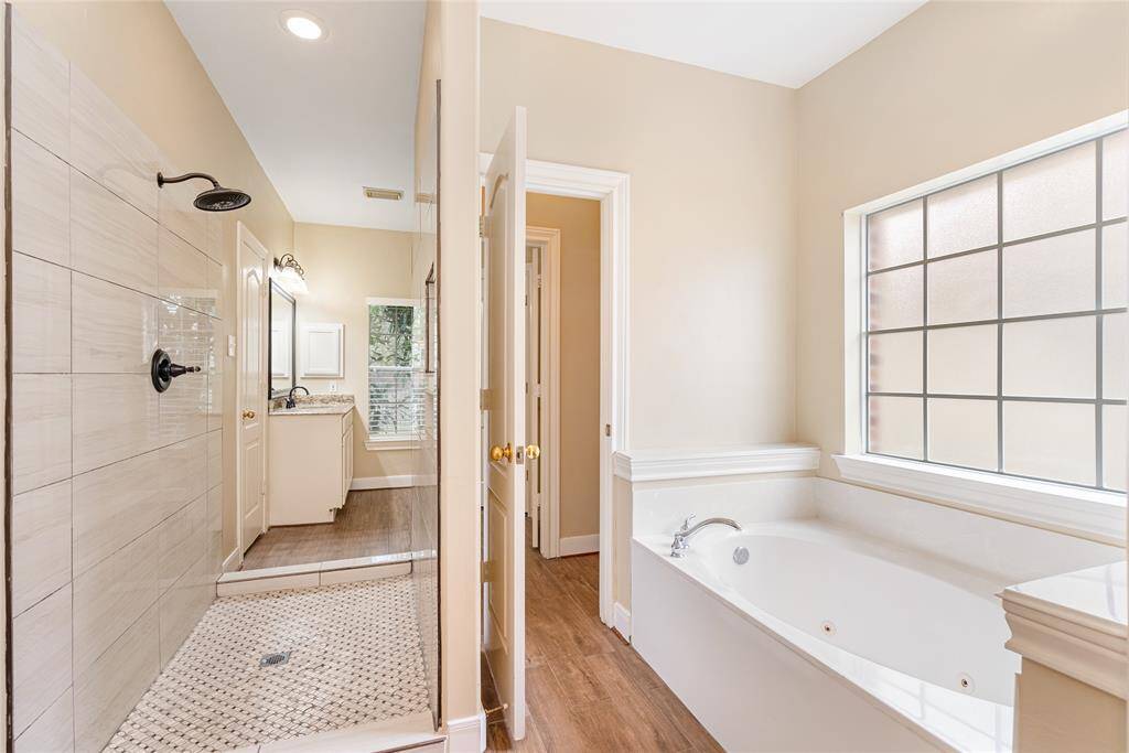 In between the individual wash areas, there's a beautifully updated shower.