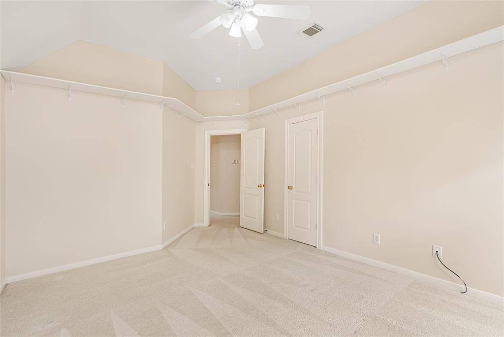 Notice the shelving, which is on the perimeter of 50% of the high ceiling, added by the owners for extra storage.