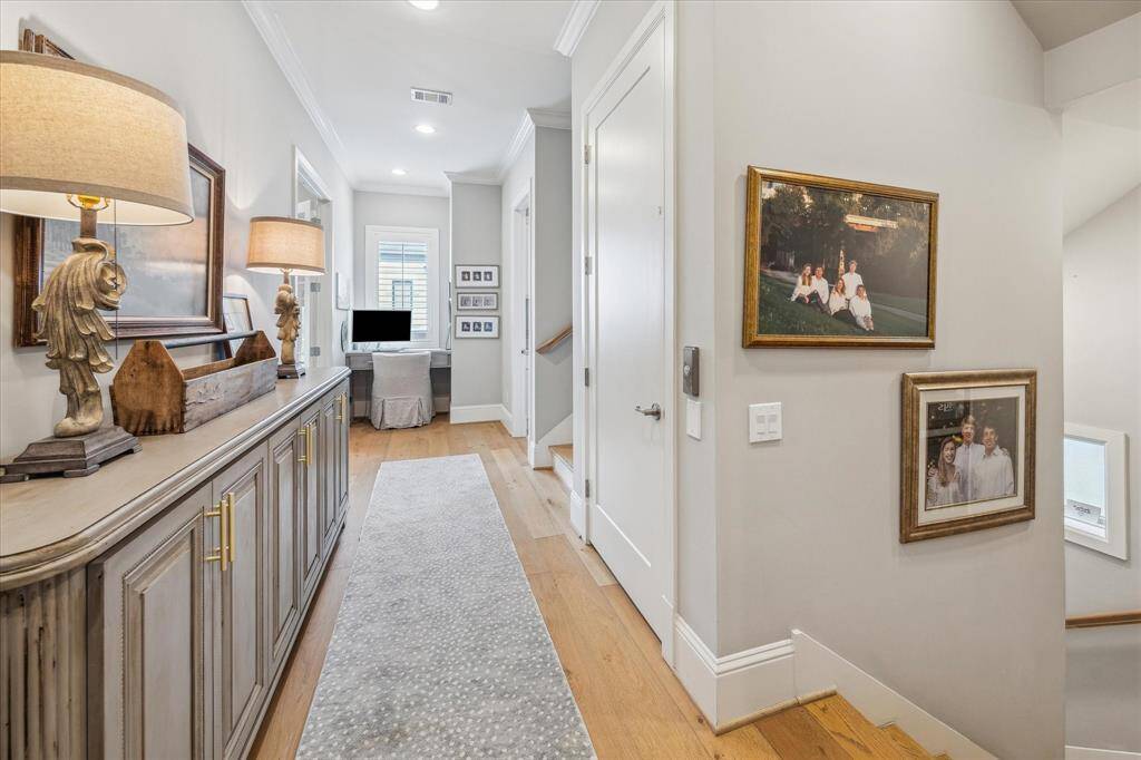 Second floor landing area with hardwoods.  The second floor is an amazing owner's retreat!