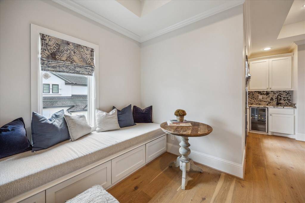 So many custom details in this home, such as this bench window seating and storage