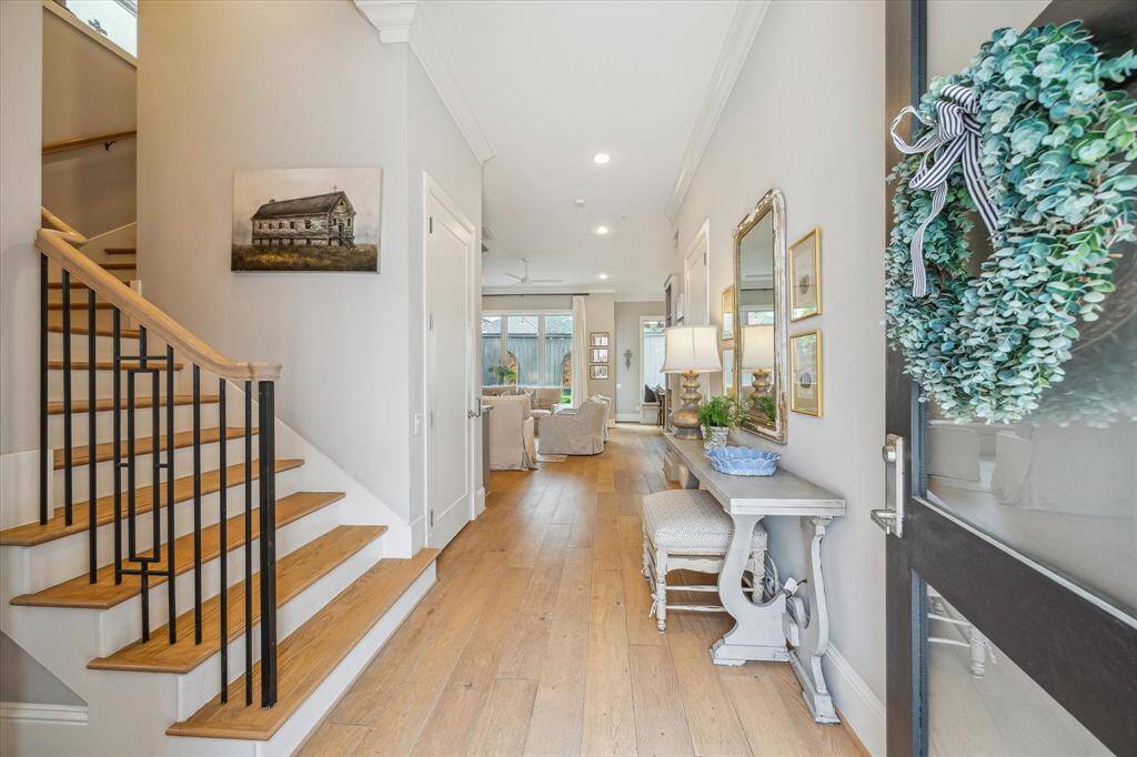 Gorgeous hardwoods greet you as you enter the home. The home features an elevator to all three floors.