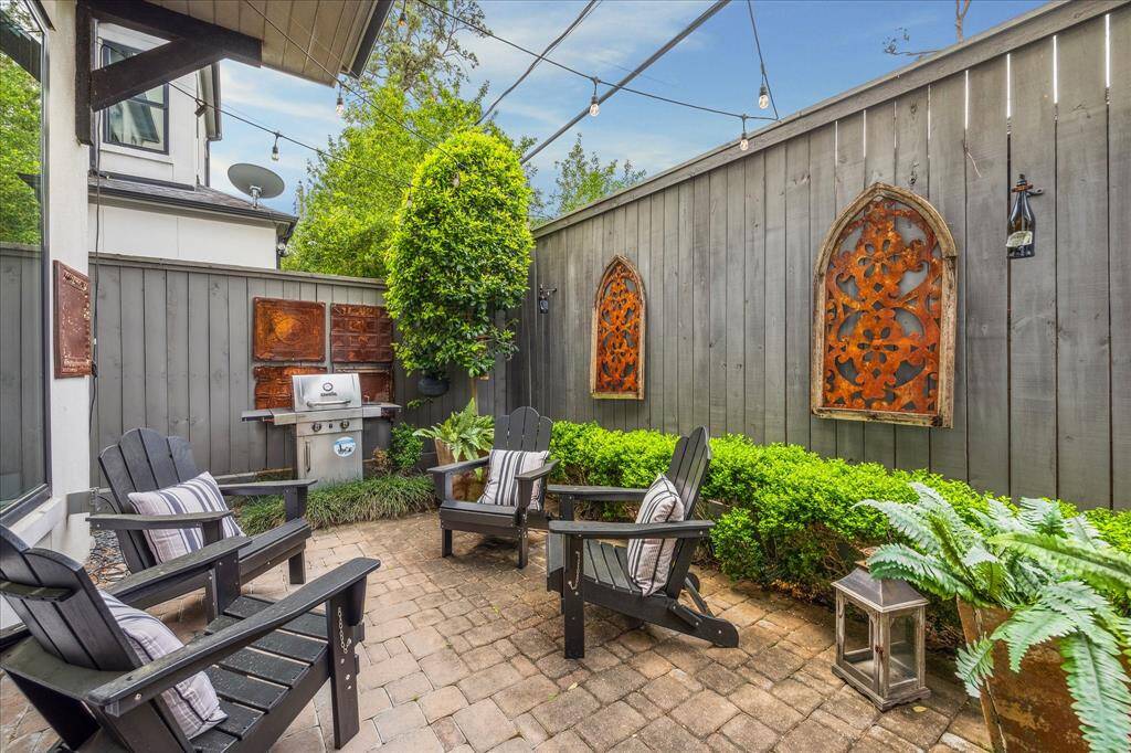 Backyard with pavers and turf...a great a place to relax and grill