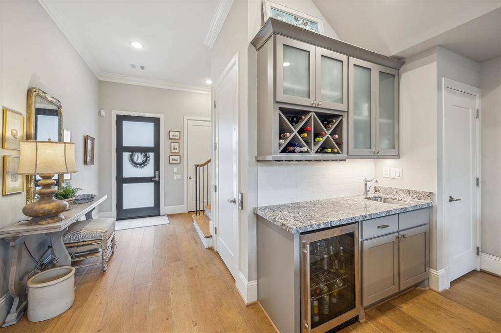 First floor wet bar with beverage refrigerator, great for entertaining