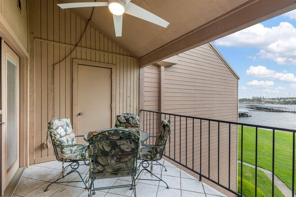 The covered patio has a ceiling fan to help keep you cool.