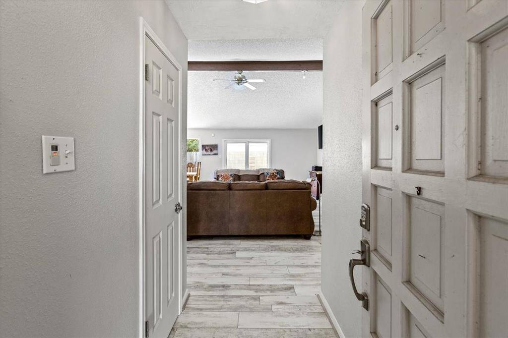 The front entry hall going towards the family room.