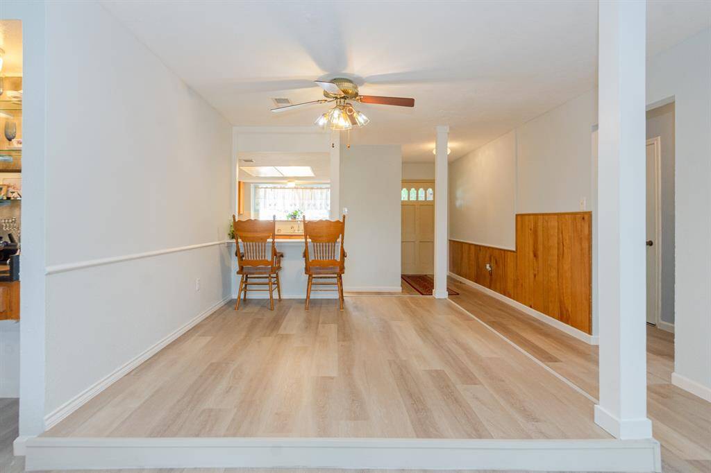 Large laundry room with extra storage.