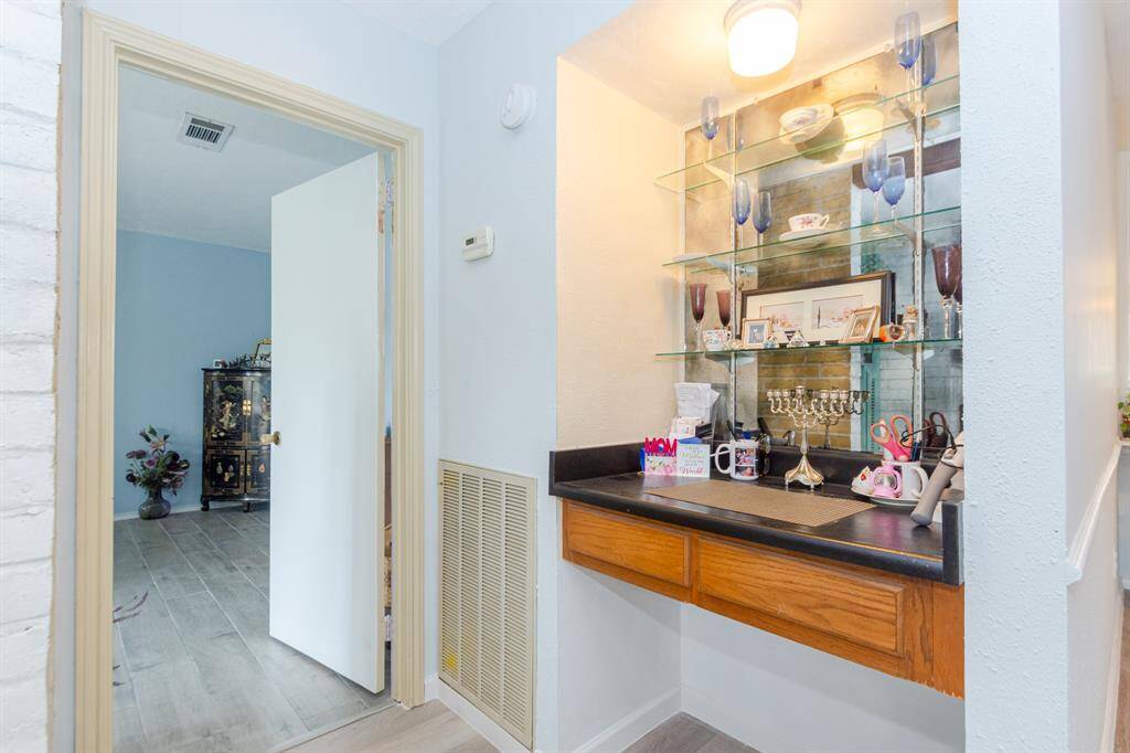 Huge primary suite with a door to the backyard.  Large walk in closet.  This room has everything