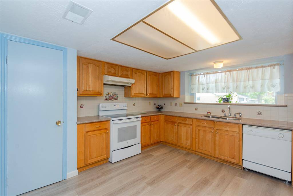 Geat flow from the kitchen with a large pantry to the dining room really brings the house together