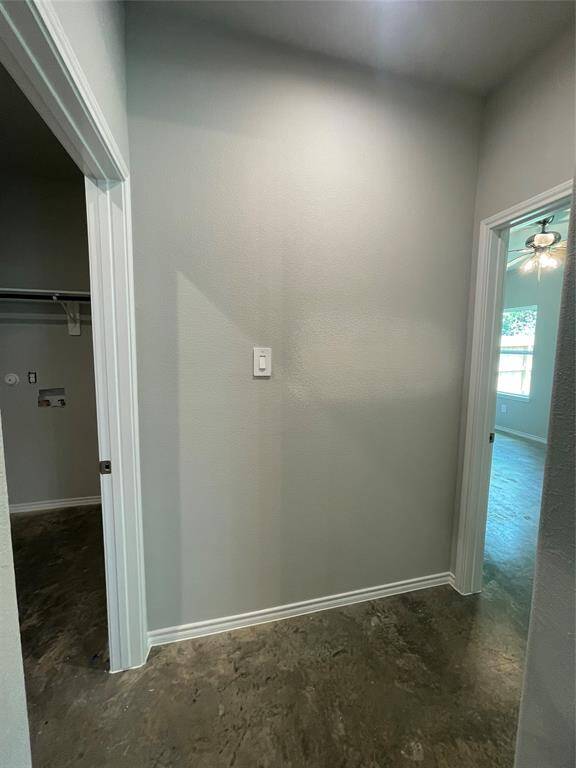 Hallway to Laundry Room/Garage and Primary Suite