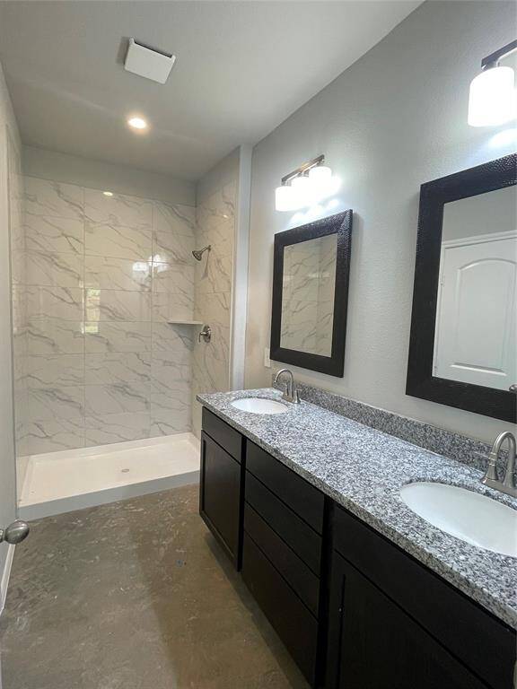 Large Walk-In Shower with Dual Vanity Sinks