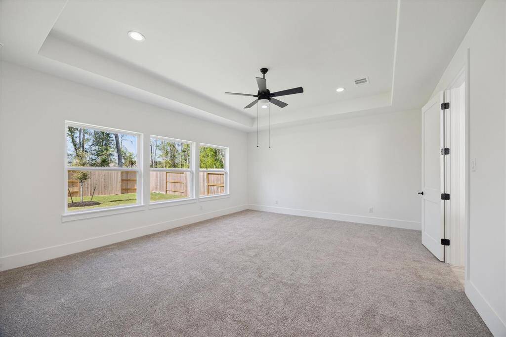 Spacious Primary Suite (situated in rear of home).