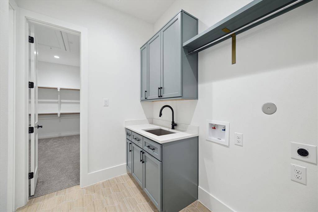 Utility Room has 2 access points - 1 is through the Primary Closet