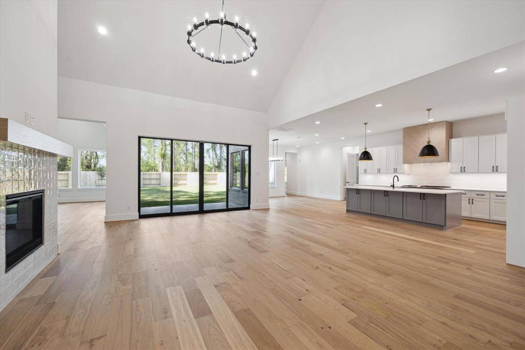 Harmonious flow throughout the Living Area, Kitchen, and Dining Area