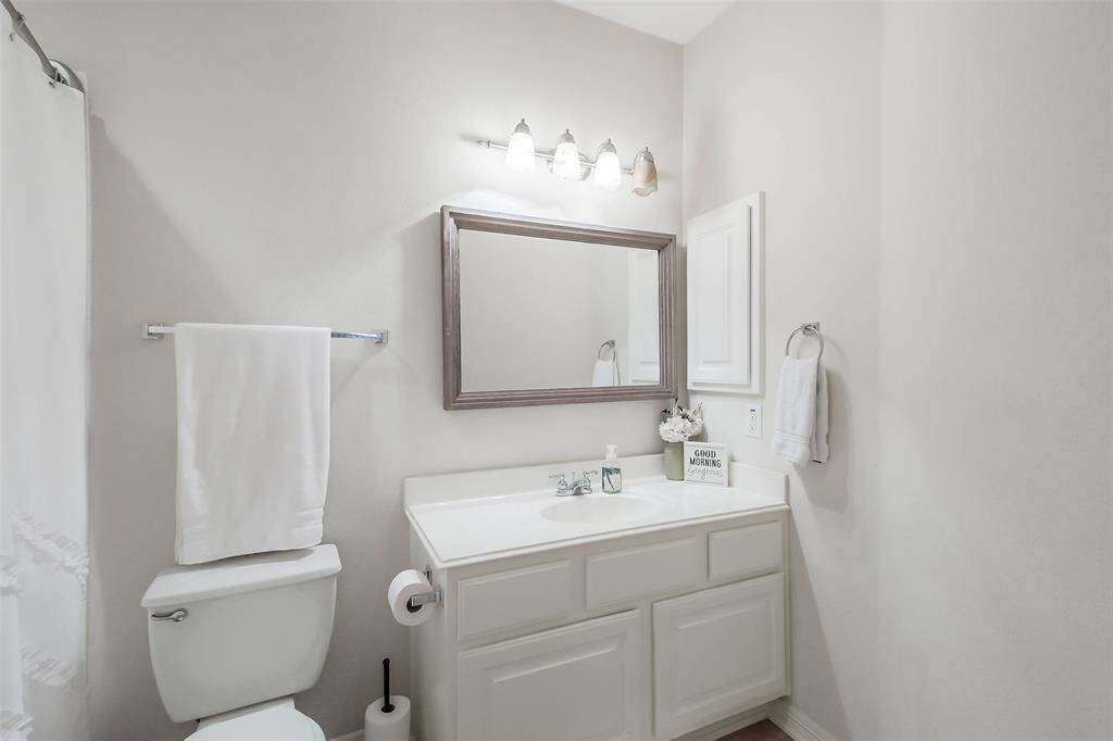 Full secondary bathroom upstairs shared with the guest bedroom and the game room.