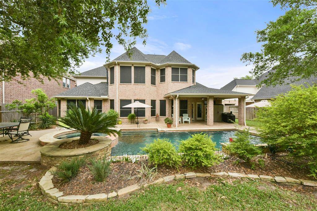 Extra green space around the pool lends room for that swing set or fire pit.