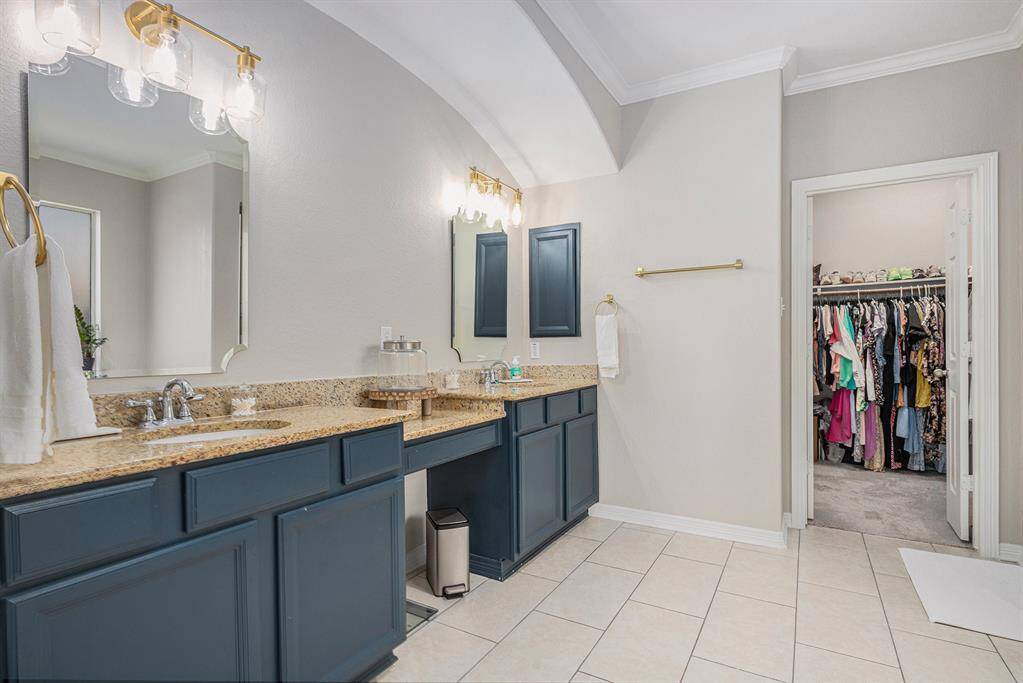 Vanity area and counter space in the primary bathroom