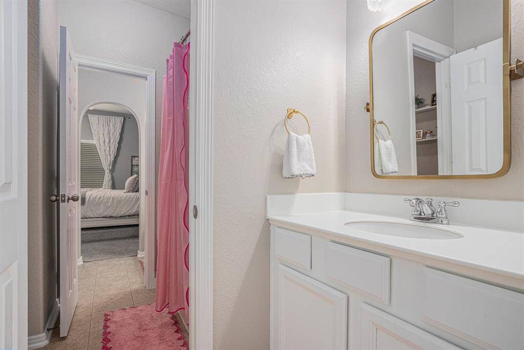 sink area in the adjoining bathroom