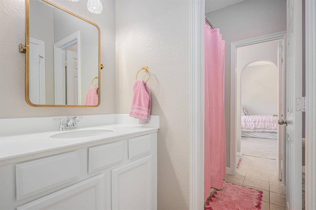 opposite sink in the adjoining bathroom