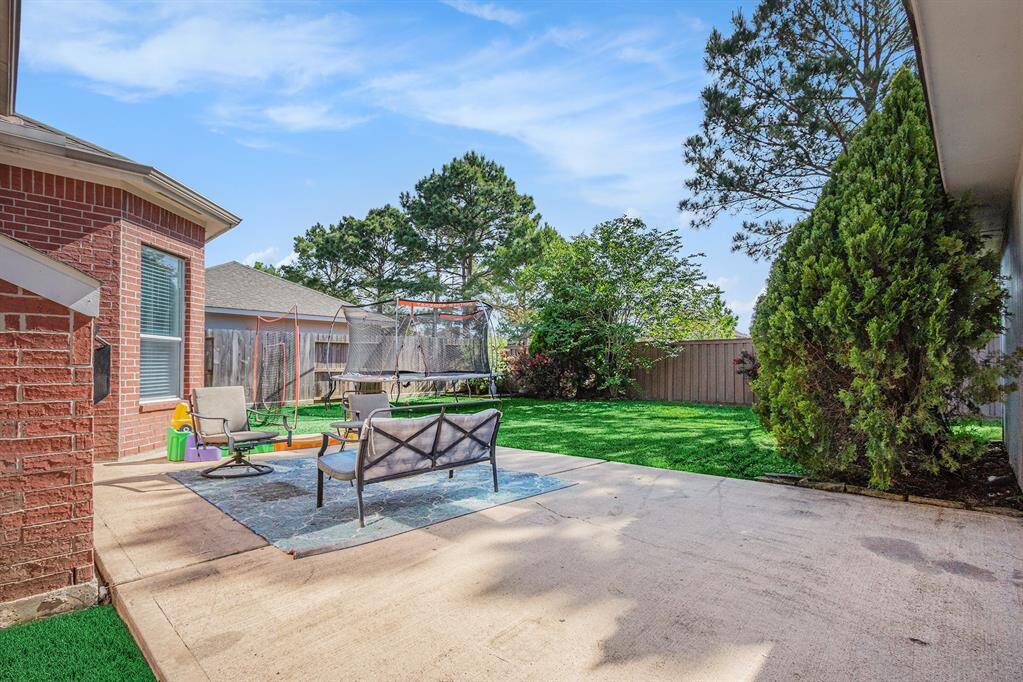 Another view of the spacious backyard