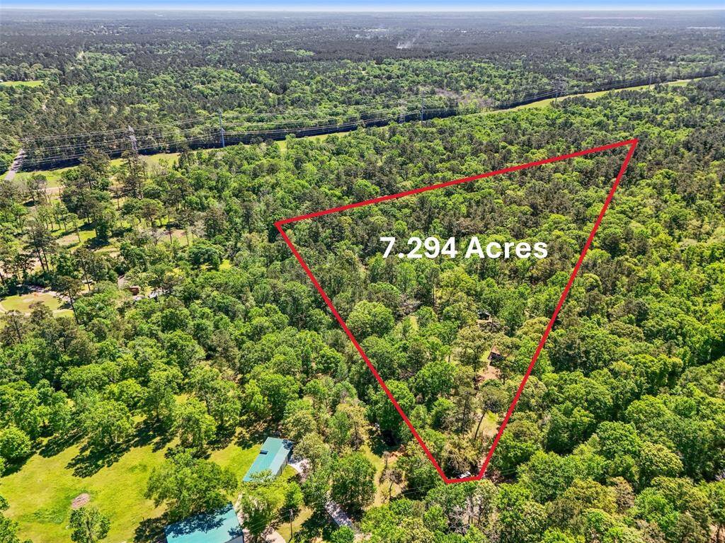 Own your slice of Texas in Plantersville. Over 7 acres.