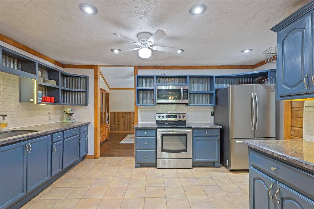 Spacious remodeled kitchen with stainless steel appliances