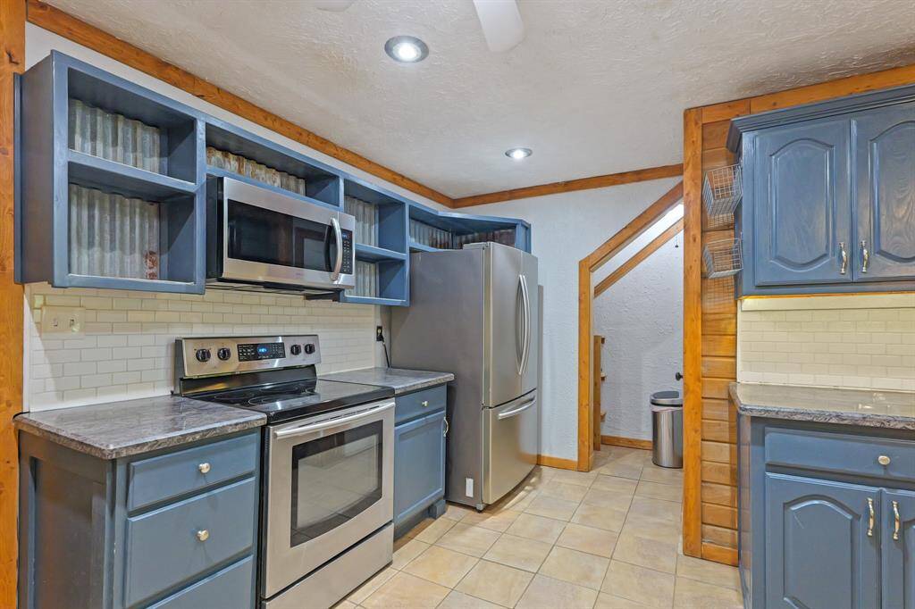 Spacious remodeled kitchen with stainless steel appliances