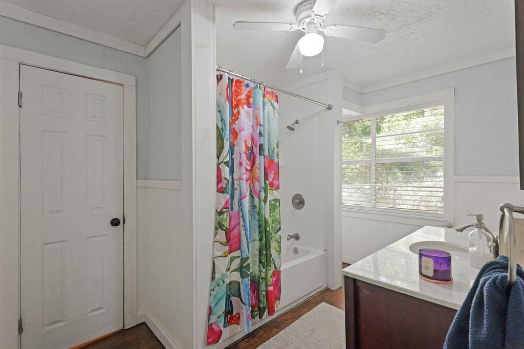 Downstairs remodeled full bathroom. Additional closet in bath.