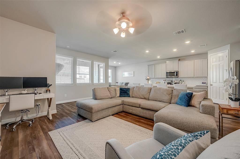 Wonderful natural light throughout the open living spaces.