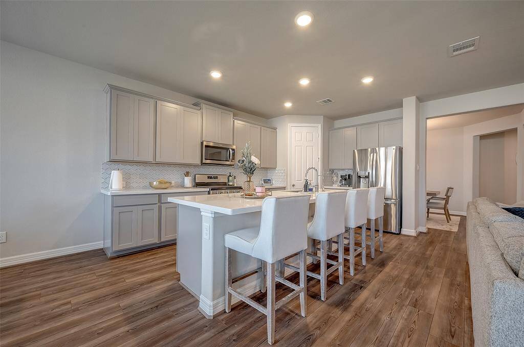 Recessed canned lighting in the kitchen.