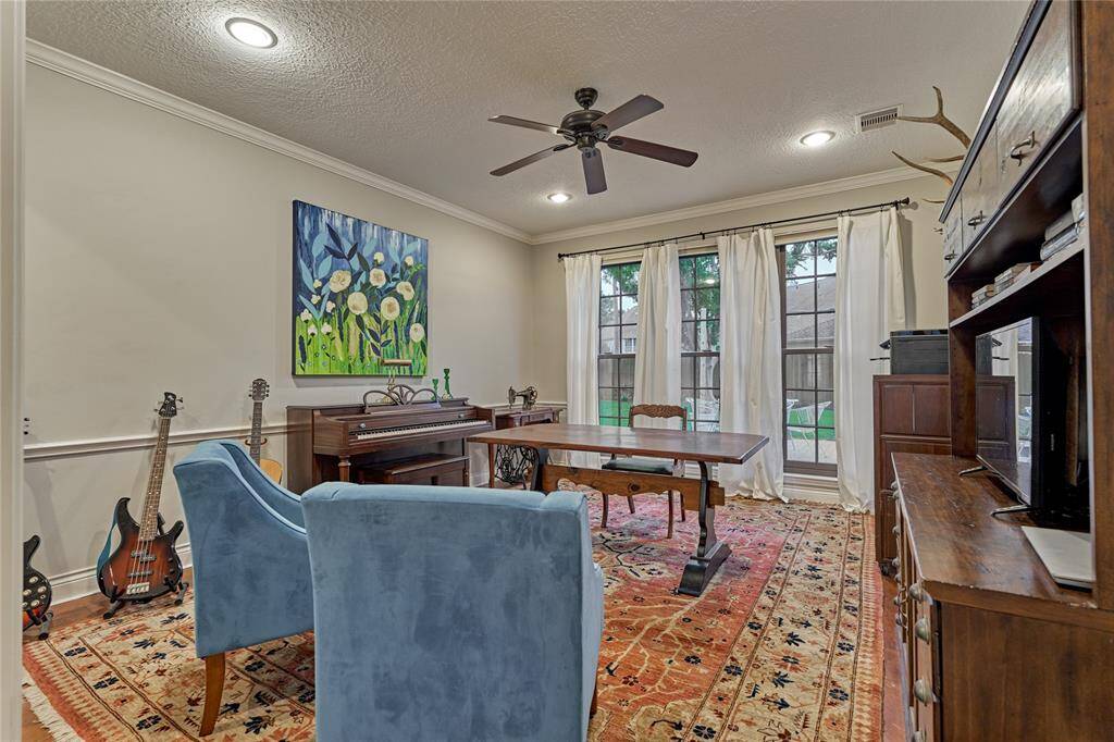 This multi-purpose room has tremendous options. It could be a formal living room,  second office space, home gym, music room or a downstairs playroom. The possibilities are endless!