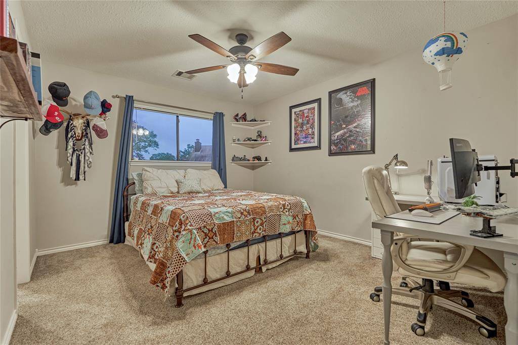 The 2nd of the 4 secondary bedrooms.