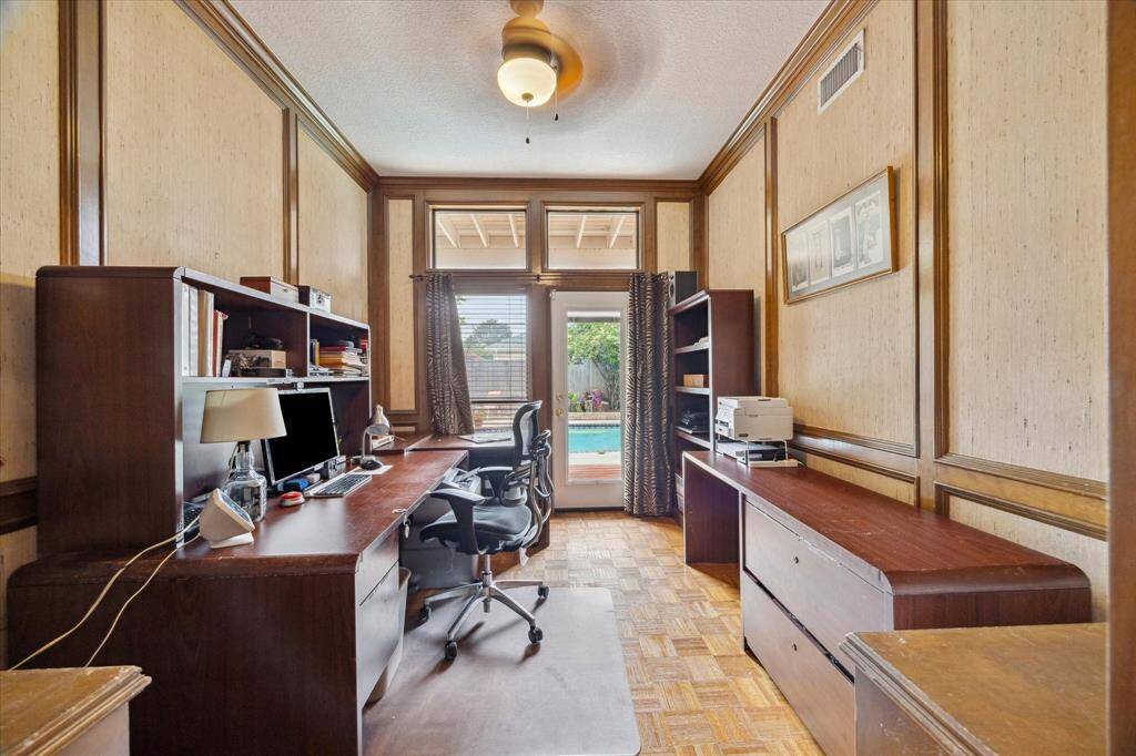 WORKING FROM HOME IS A BREEZE WITH VIEWS AND ACCESS TO THE BACKYARD AND POOL!