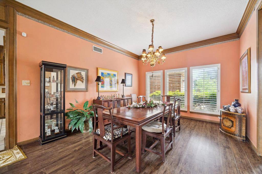 ANOTHER PEEK AT THE DINING ROOM WITH PLENTY OF ROOM FOR LARGE FURNITURE.
