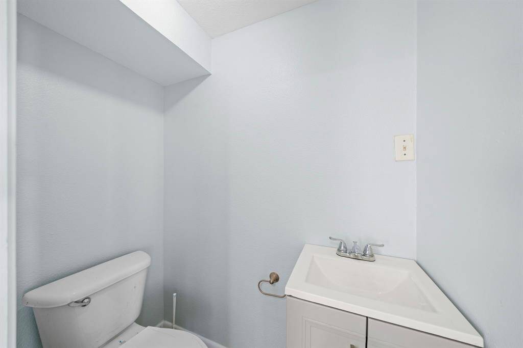 Half bath off the left side of the property entrance.